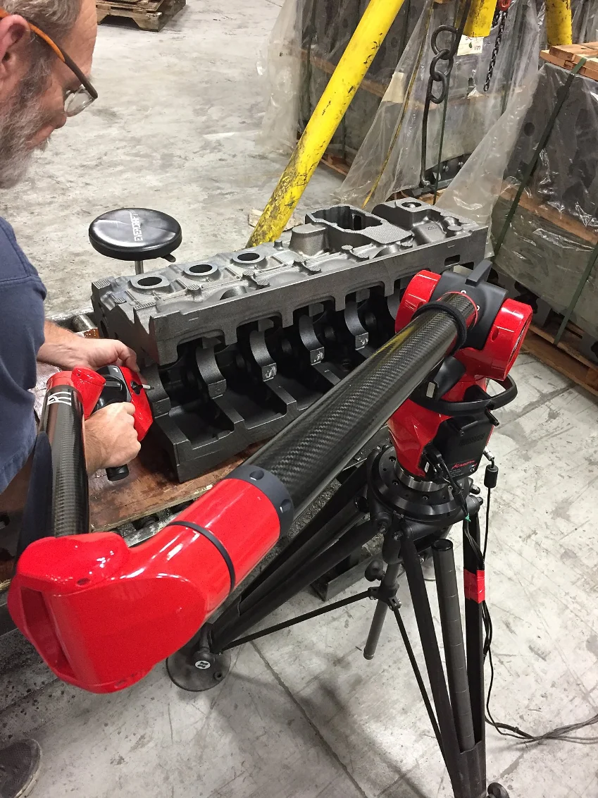 Diesel engine block casting inspected with a portable measuring arm